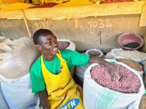Photo 3: Munyantore Peter, a young bean trader at Kimironko Market